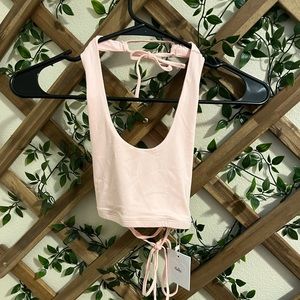 Xs never worn with the light pink adika crop tank!